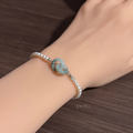 Interlocking Bluish Green · Bracelet